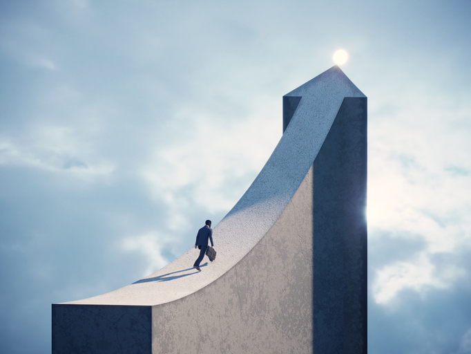 Businessperson climbing a curved upward path, symbolizing growth and opportunities associated with offshore company formation.